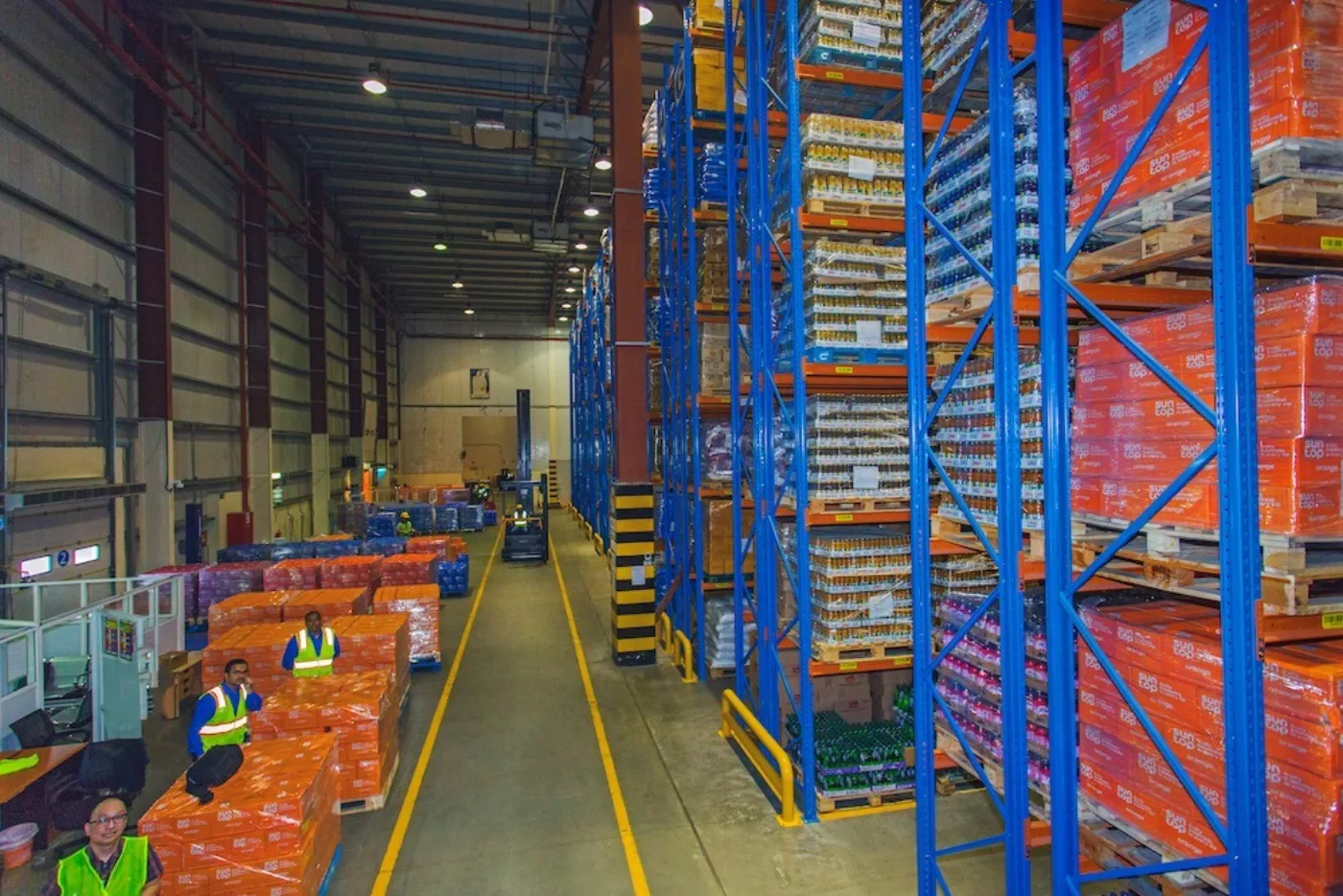 AMJ warehouse floor with stocked pallet lanes